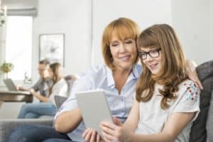 Depositphotos 57272745 Stock Photo Mother And Daughter Using Digital